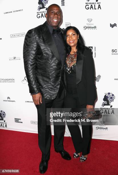 Magic Johnson and Cookie Johnson attend the Wearable Art Gala at California African American Museum on April 29, 2017 in Los Angeles, California.