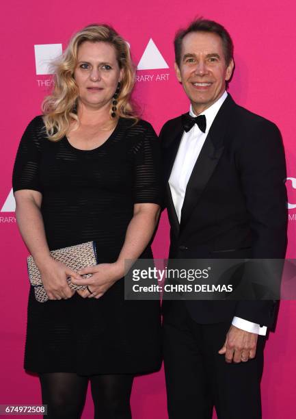 Jeff Koons and his wife Ilona Staller attend the MOCA annual gala at the Geffen Contemporary at MOCA in Los Angeles, on April 29, 2017. / AFP PHOTO /...