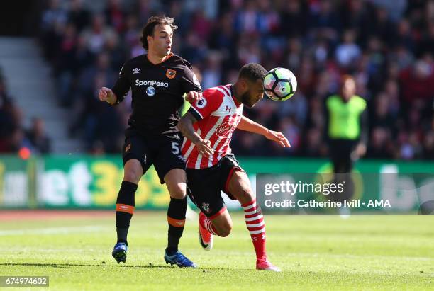 Lazar Markovic of Hull City and Ryan Bertrand of Southampton during the Premier League match between Southampton and Hull City at St Mary's Stadium...