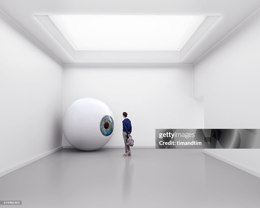 Giant eye in gallery room