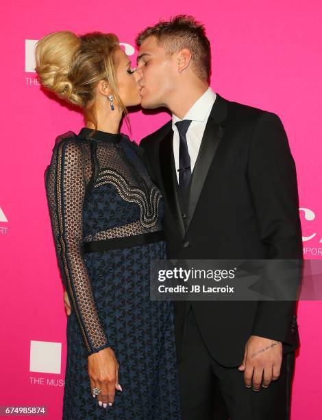 Paris Hilton and Chris Zylka attend the MOCA Gala 2017 on April 29, 2017 in Los Angeles, California.