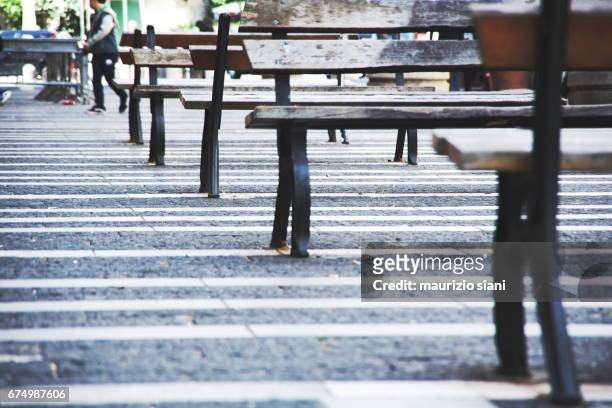 bench in naples (italy) - solitudine stock-fotos und bilder