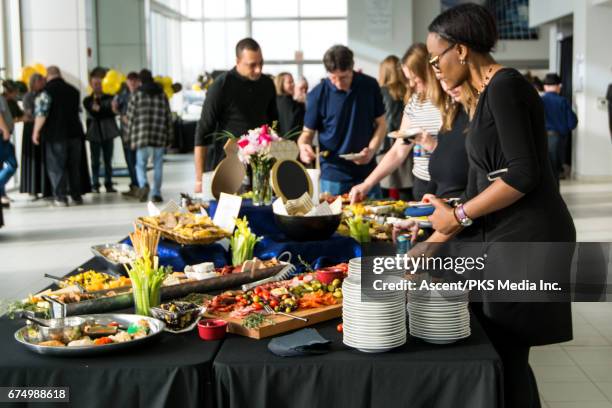 people socialize at conference meeting/luncheon - buffet food stock pictures, royalty-free photos & images