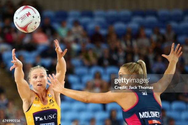 Laura Langman of the Lightning passes during the round 10 Super Netball match between the Vixens and the Lightning at Margaret Court Arena on April...