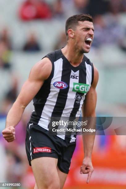 Scott Pendlebury of the Magpies celebrates a goal during the round six AFL match between the Geelong Cats and the Collingwood Magpies at Melbourne...
