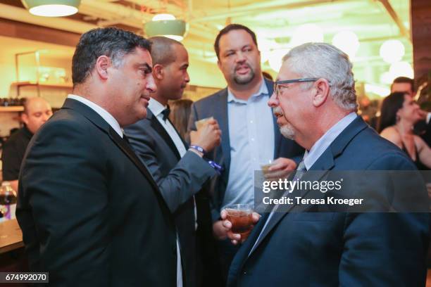 Cenk Uygur, founder, CEO, and host of The Young Turks , and Ben Jealous speak with guests at The Young Turks' Watchdog Correspondents' dinner on...