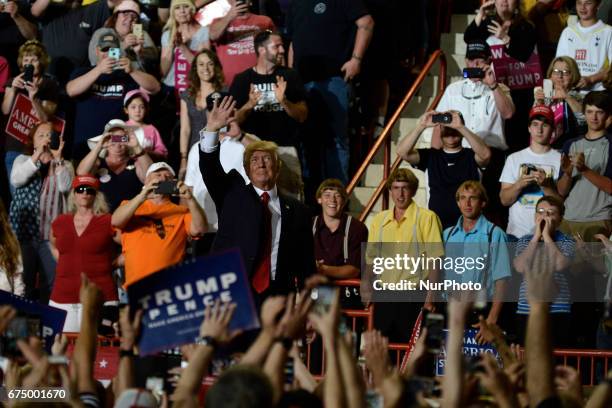 President Donald Trump greets supporters after a April 29, 2017 rally in Harrisburg, PA. The Make America Great Again event is to celebrate the...