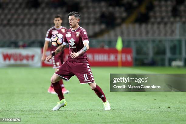 Daniele Baselli of Torino FC in action during the Serie A football match between Torino FC and Uc Sampdoria . The match ended in a 1-1 draw.