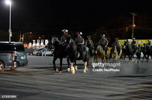 Mounted State Troopers and officers in full riot outside a rally of President Donald Trump, in Harrisburg, PA, on April 29, 2017. The Make America...