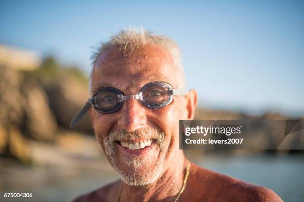 handsome active senior in the water - seniors extreme sports stock pictures, royalty-free photos & images