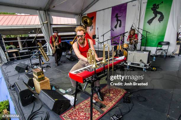 Noah Adams of Dirty Bourbon River Show performs at the New Orleans Jazz & Heritage Festival at Fair Grounds Race Course on April 29, 2017 in New...