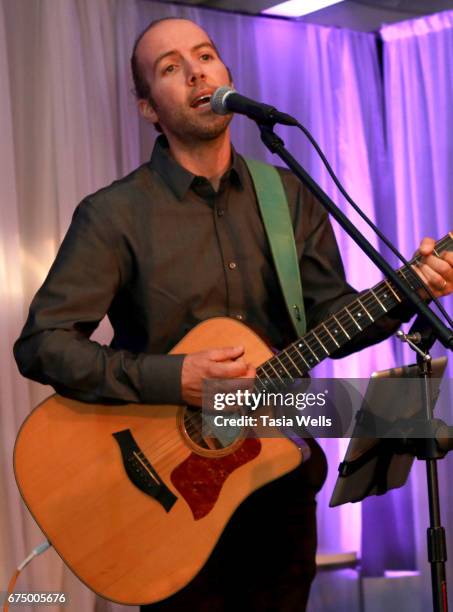 Musician Kenli Mattus performs onstage at the Unmasque Cancer Masquerade benefit supporting young adult cancer survivors at The Mark for Events on...