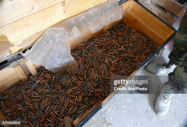 An Armoury packed with multiple weapons and ammunition that is is used for training Peshmerga is under heavy security in an undisclosed location...