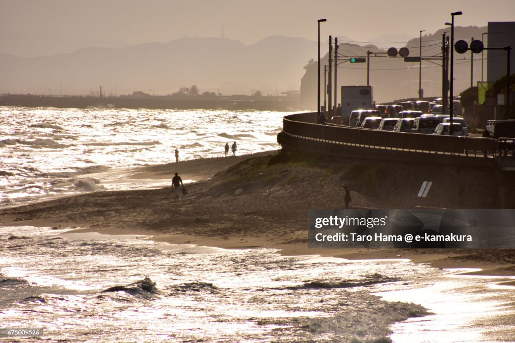 Traffic jam on the route by the sunset beach