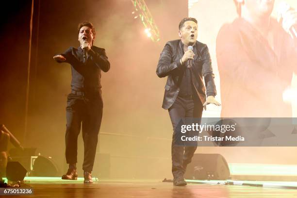 Freddy Maerz and Martin Marcell of the band Fantasy perform during 'Die Schlagernacht des Jahres' at Lanxess Arena on April 29, 2017 in Cologne,...