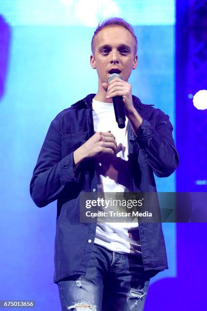 German singer Sandro Malinowski performs during 'Die Schlagernacht des Jahres' at Lanxess Arena on April 29, 2017 in Cologne, Germany.