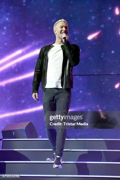 German singer Julian David performs during 'Die Schlagernacht des Jahres' at Lanxess Arena on April 29, 2017 in Cologne, Germany.