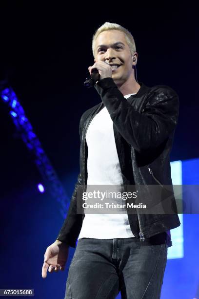 German singer Julian David performs during 'Die Schlagernacht des Jahres' at Lanxess Arena on April 29, 2017 in Cologne, Germany.