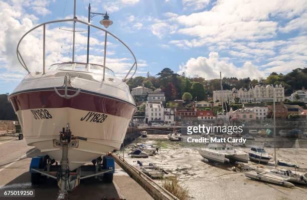 Boats are seen at low tide in the harbour in St Aubin on April 13, 2017 near St Helier, Jersey. Jersey, which is not a member of the European Union,...