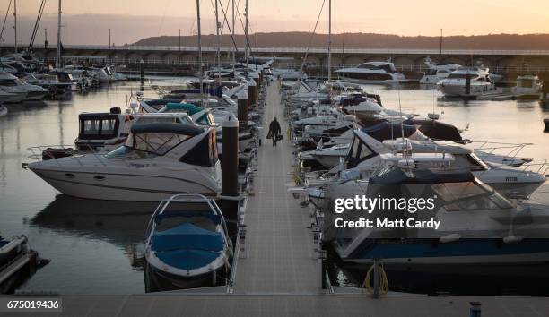 The sun sets over boats and yachts in Elizabeth Marina on April 12, 2017 in St Helier, Jersey. Jersey, which is not a member of the European Union,...