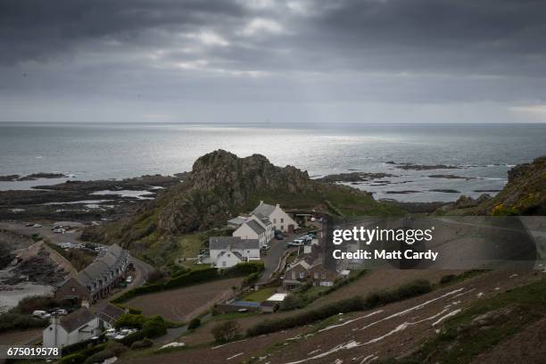 The sun tries to break through clouds seen from st Quen on April 12, 2017 near St Helier, Jersey. Jersey, which is not a member of the European...