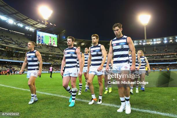 Joel Selwood of the Cats Patrick Dangerfield, Tom Lonergan and Tom Hawkins of the Cats lead the team out off after defeat during the round six AFL...