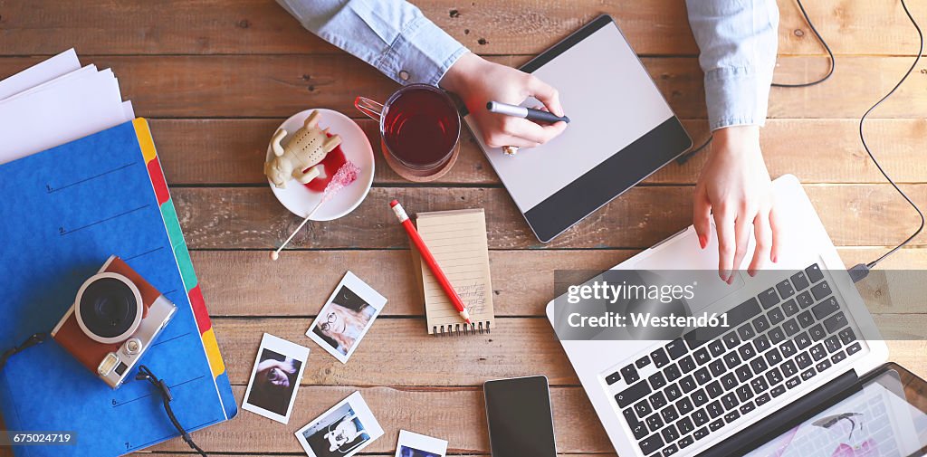 Illustrator working at home using a graphics tablet
