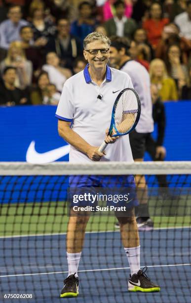 Bill Gates in action against Mike McCready and John Isner at the Match For Africa 4 exhibition match at KeyArena on April 29, 2017 in Seattle,...