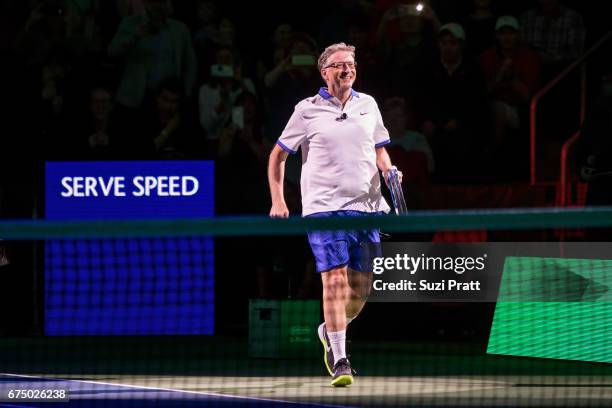 Bill Gates enters the tennis court at the Match For Africa 4 exhibition match at KeyArena on April 29, 2017 in Seattle, Washington.