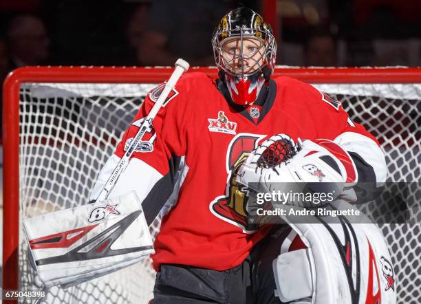 Craig Anderson of the Ottawa Senators looks on from his crease during player introductions prior to playing against the New York Rangers in Game One...