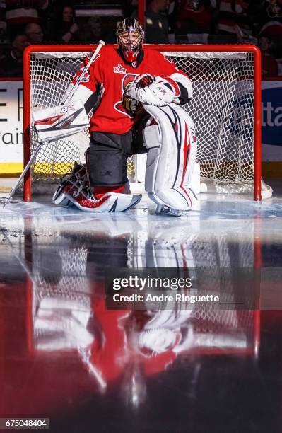 Craig Anderson of the Ottawa Senators stretches in his crease during player introductions prior to playing against the New York Rangers in Game One...