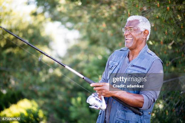 diverse active seniors - hunting fishing stock pictures, royalty-free photos & images