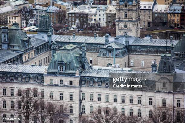 as seen from grande allée, view of the beautiful quebec parliament, where the quebec government members sit to make decisions about the province affairs. - quebec parliament stock pictures, royalty-free photos & images