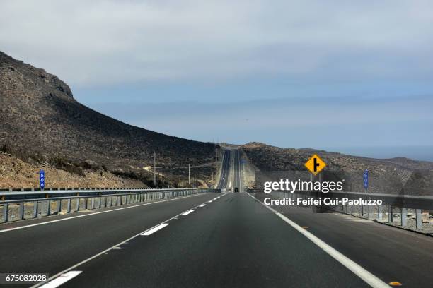 highway and road sign near la serena, coquimbo region, chile - la serena stock pictures, royalty-free photos & images