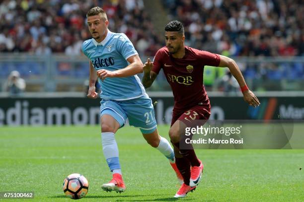 Sergej Milinkovic Savic of SS Lazio compete for the ball with Emerson Palmieri of AS Roma during the Serie A match between AS Roma and SS Lazio at...