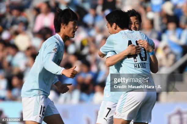 Kota Ueda of Jubilo Iwata celebrates scoring his side's second goal with his team mates Koki Ogawa and Hayao Kawabe during the J.League J1 match...