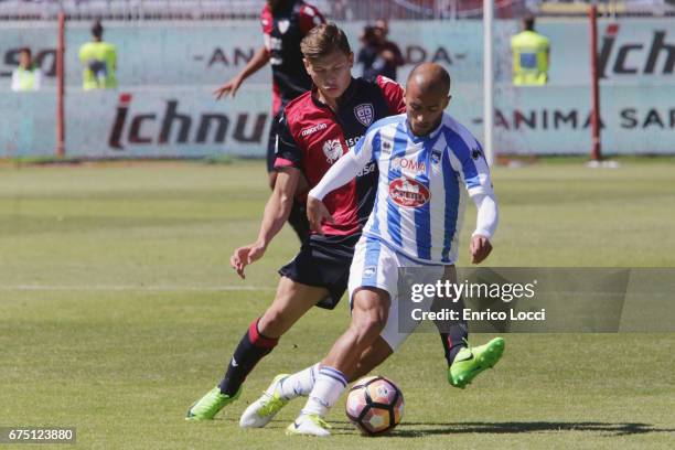 Nicolò BArella of Cagliari contrast a player of Pascare during the Serie A match between Cagliari Calcio and Pescara Calcio at Stadio Sant'Elia on...