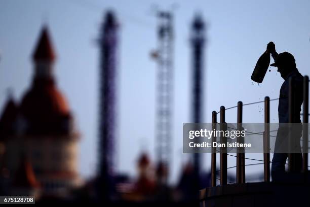 Race winner Valtteri Bottas of Finland and Mercedes GP celebrates on the podium after the Formula One Grand Prix of Russia on April 30, 2017 in...