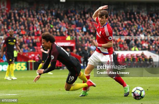 Leroy Sane of Manchester City is fouled by Marten de Roon of Middlesbrough in the box and a penalty is awarded to Manchester City during the Premier...