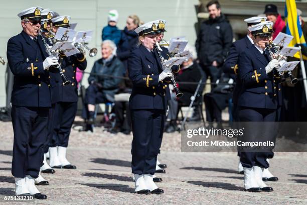 Members of the Swedish royal marching band performs during a celebration of King Carl Gustav's 71st birthday at the royal palace on April 30, 2017 in...