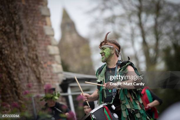 The Pentacle Drummers perform ahead of the Glastonbury Dragons being paraded through the town as part of the Glastonbury Dragon's May Fayre which is...