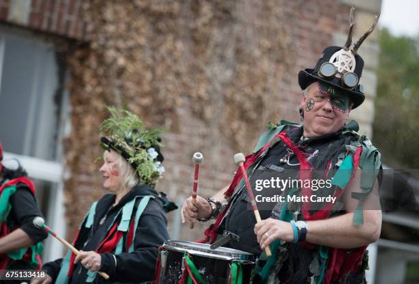 The Pentacle Drummers perform ahead of the Glastonbury Dragons being paraded through the town as part of the Glastonbury Dragon's May Fayre which is...