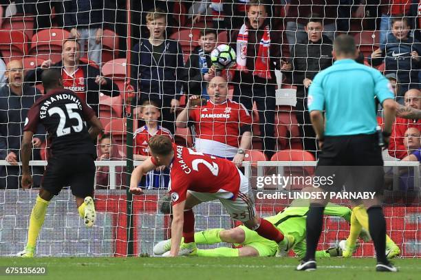 Middlesbrough's English defender Calum Chambers scores the team's second goal during the English Premier League football match between Middlesbrough...
