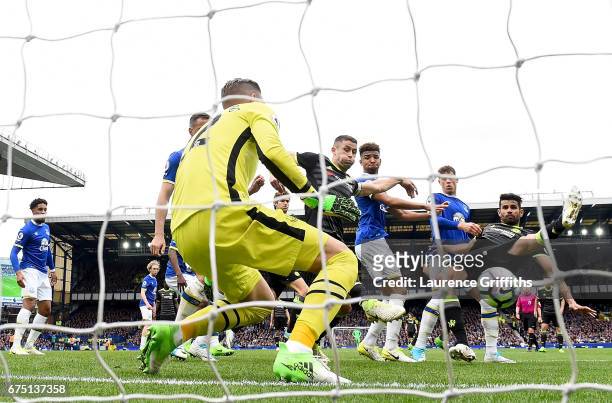Gary Cahill of Chelsea celebrates scoring his sides second goal past Maarten Stekelenburg of Everton during the Premier League match between Everton...