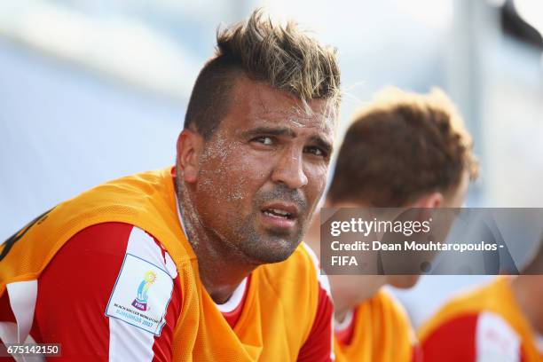 Covered in sand, Dejan Stankovic of Switzerland looks on from the bench during the FIFA Beach Soccer World Cup Bahamas 2017 group A match between...