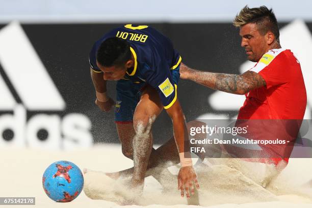 Dejan Stankovic of Switzerland battles for the ball with Jorge Bailon of Ecuador during the FIFA Beach Soccer World Cup Bahamas 2017 group A match...