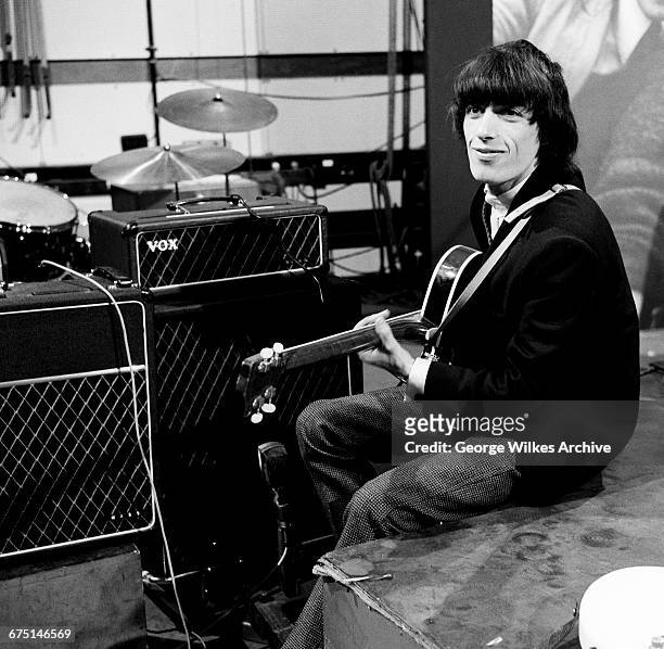 English bassist Bill Wyman of The Rolling Stones, during rehearsals for an episode of the Friday night TV pop/rock show 'Ready Steady Go!', at...