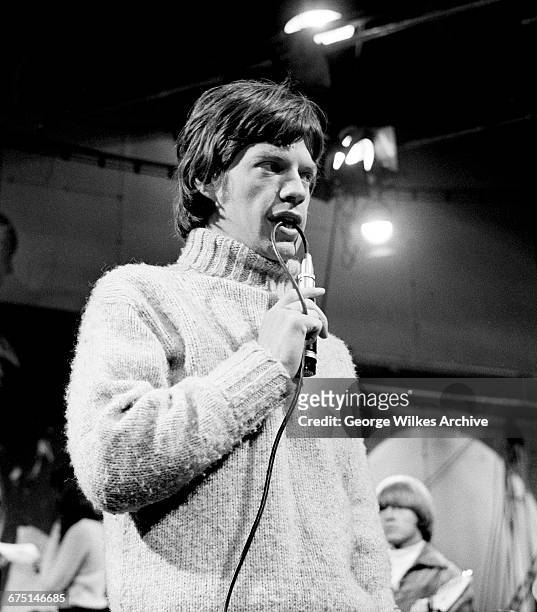 Singer Mick Jagger of The Rolling Stones, during rehearsals for an episode of the Friday night TV pop/rock show 'Ready Steady Go!', at...