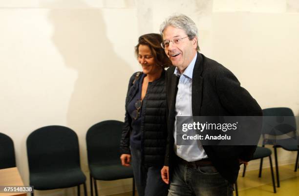 Italian Prime Minister Paolo Gentiloni and his wife Emanuela Mauro arrive to vote at the primary elections of the Italian Democratic Party leadership...