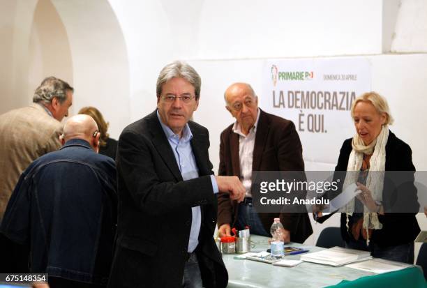 Italian Prime Minister Paolo Gentiloni arrives to cast his ballot at the primary elections of the Italian Democratic Party leadership in Rome, Italy...